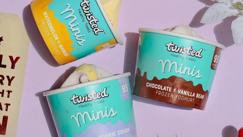 Twisted mini yogurts on a purple background