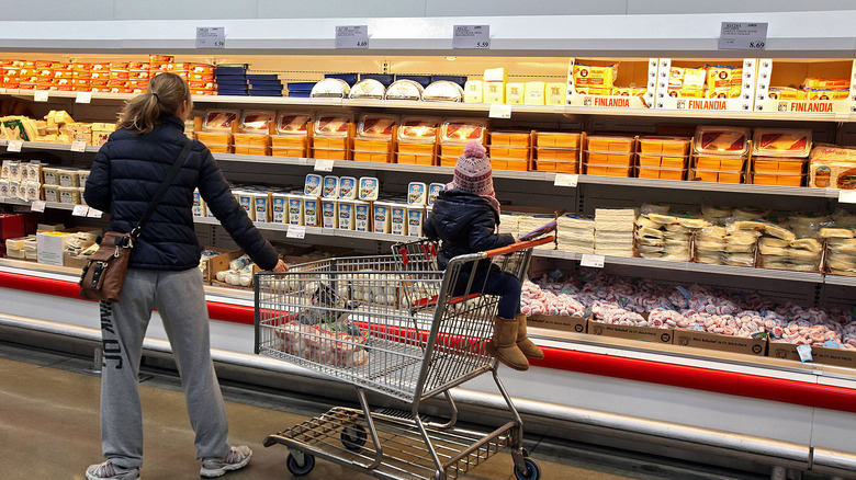 Costco cheese aisle with mom and child