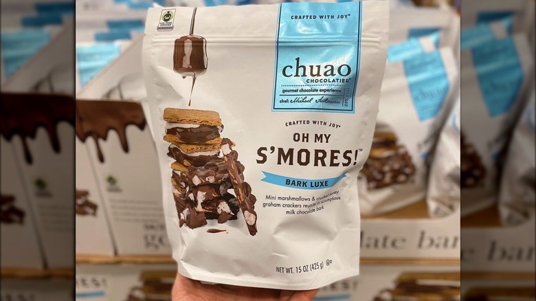 hand holding chuao chocolatier s'mores bark