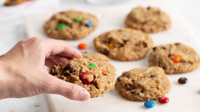 Person holding a Meli's Monster Cookie