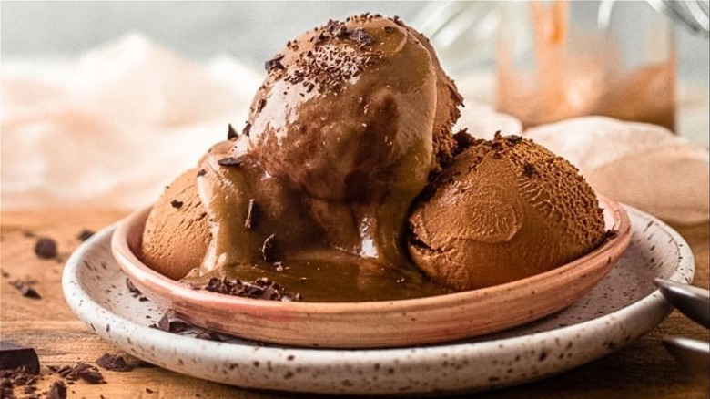 Scoops of melting chocolate ice cream