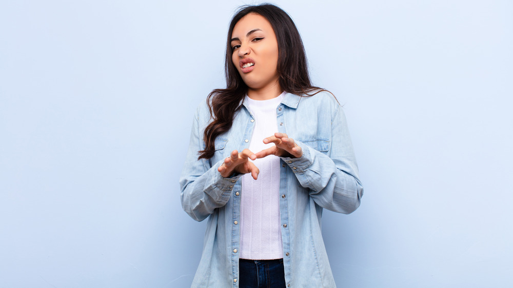Woman apparently saying yuck