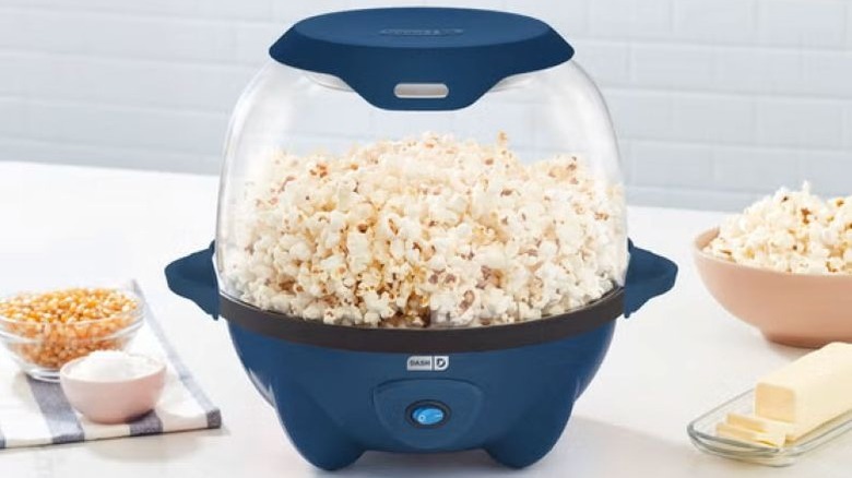 Popcorn maker with clear bowl top and blue base