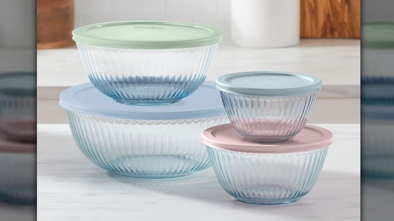 Glass mixing bowls in four sizes with pastel plastic lids