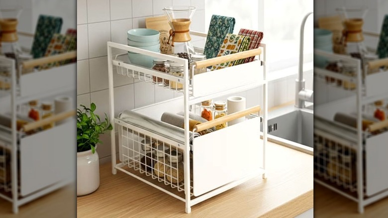 Two-tier metal organizer in white with large-mesh drawers and wood handles