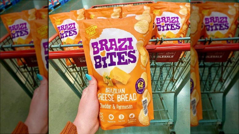 Hand holding bag of Brazi Bites
