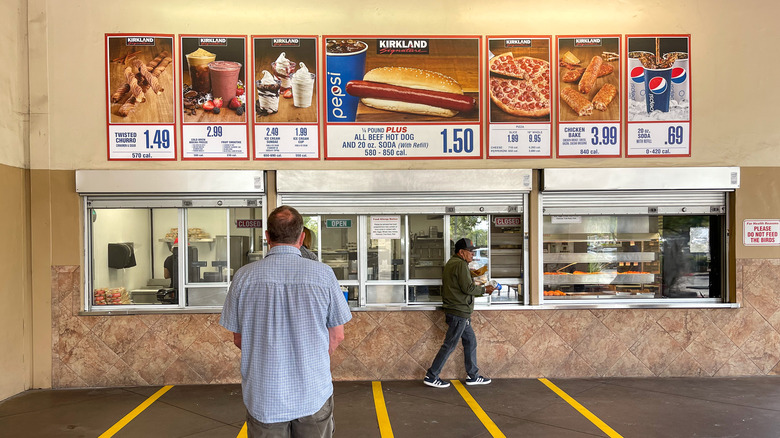 Customers at Costco food court window