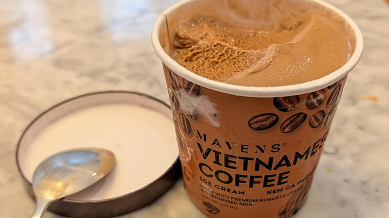 open pint of Mavens Vietnamese Coffee Ice Cream with spoon