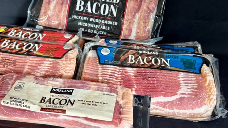Four packs of Kirkland Signature bacon