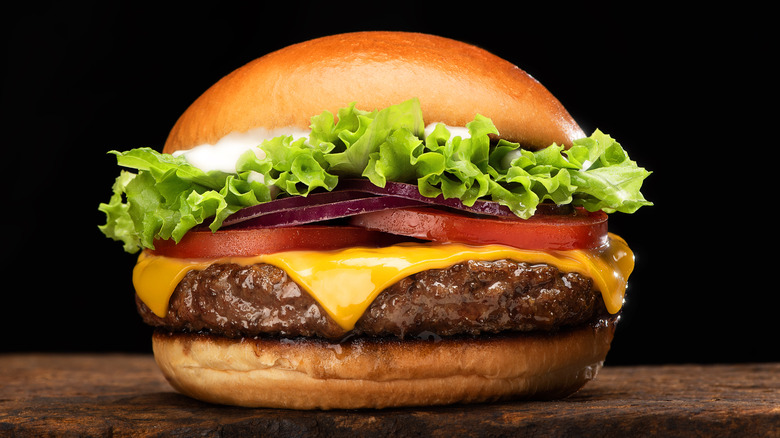 Cheeseburger on wooden table