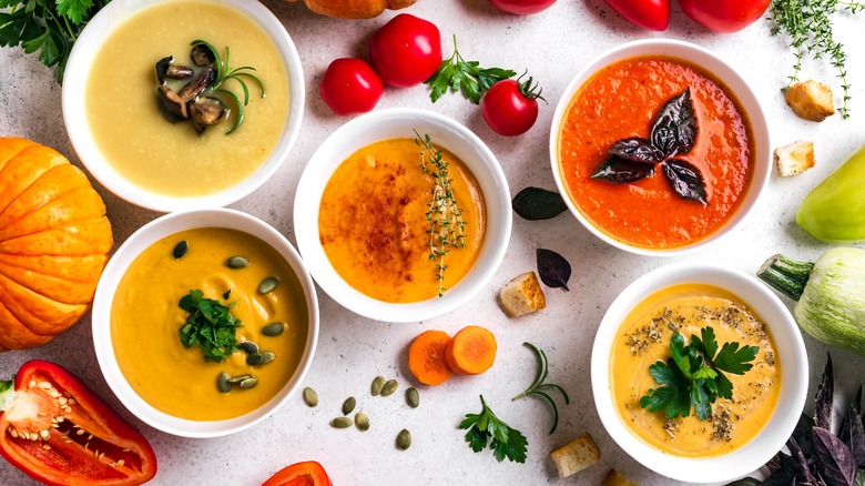 assorted soups in bowls
