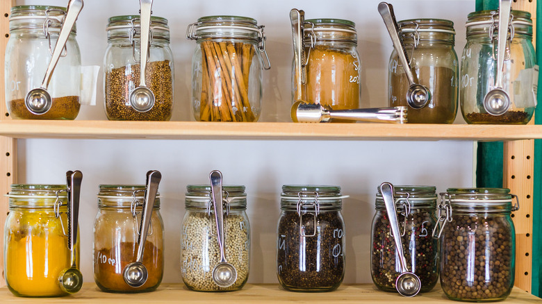 Shelves with jars of spices