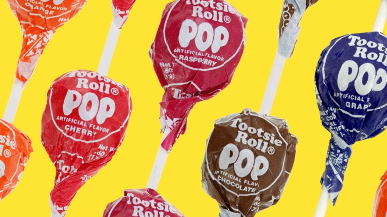 Tootsie Pops on a yellow background