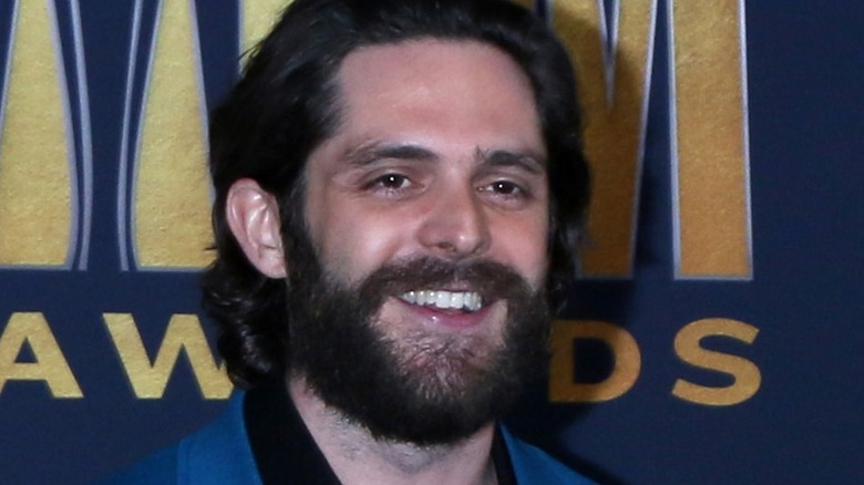 Thomas Rhett smiling