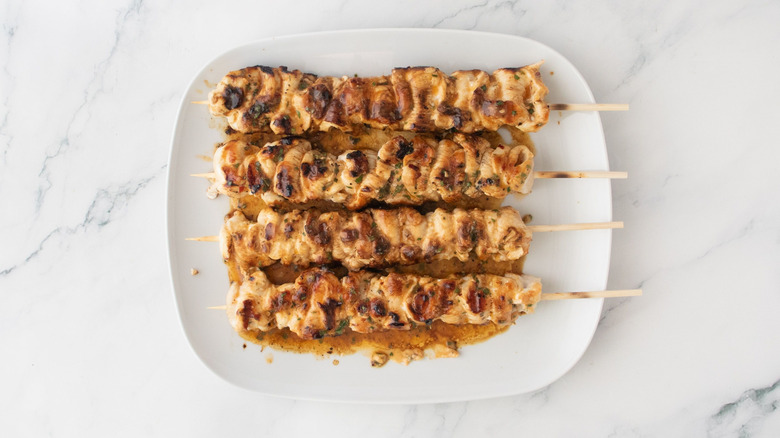 Cowboy butter chicken kabobs on plate