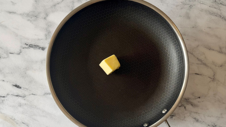 Pat of butter in pan