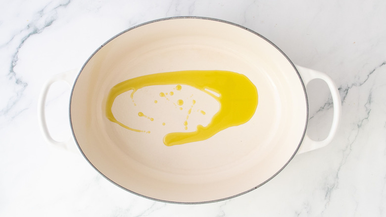 Drizzle of oil in large Dutch oven