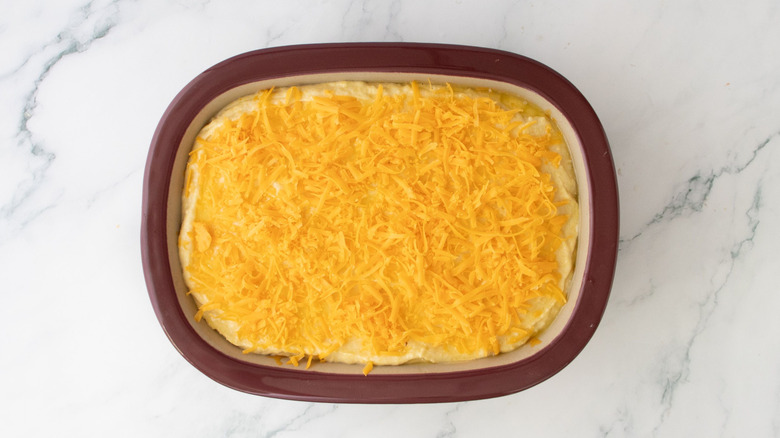 Cheese topped casserole in baking dish