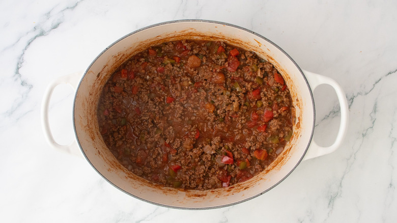 Beef chili mixture in Dutch oven
