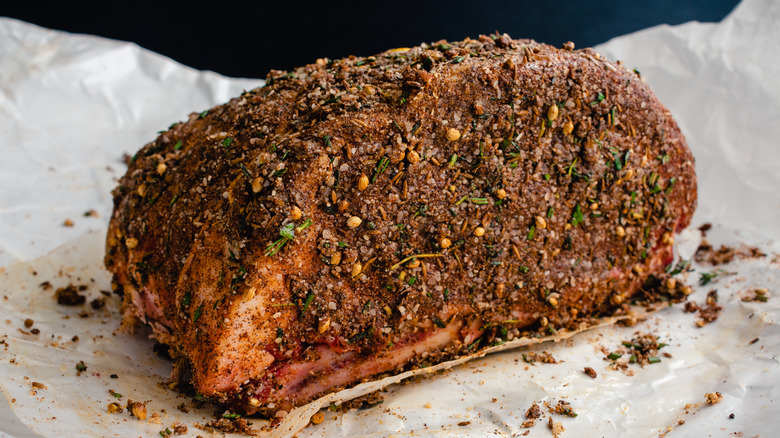 Uncooked prime rib prepped with a spice rub