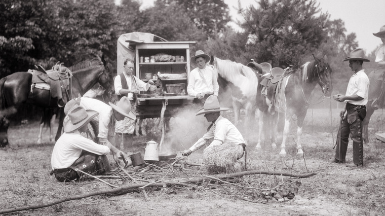 Cowboys cooking food