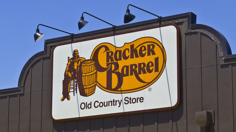 Yellow and brown Cracker Barrel logo on building