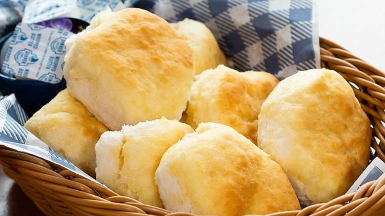 basket of cracker barrel biscuits with butter