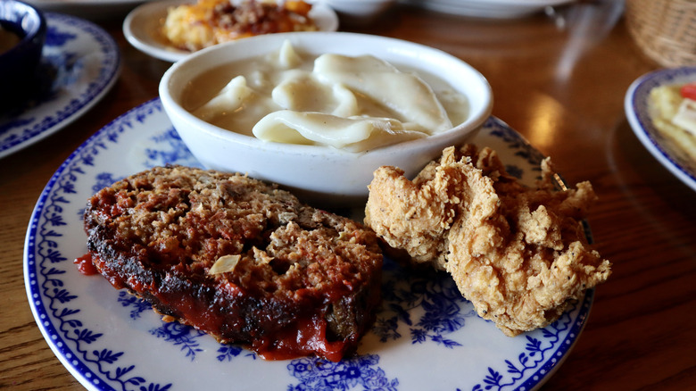 meatloaf, fried chicken, chicken and dumplings on plate