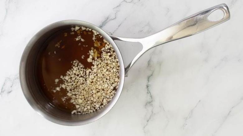 Sweet chili sauce ingredients in saucepan