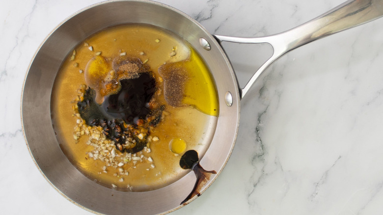 Tamarind cashew sauce ingredients in saucepan