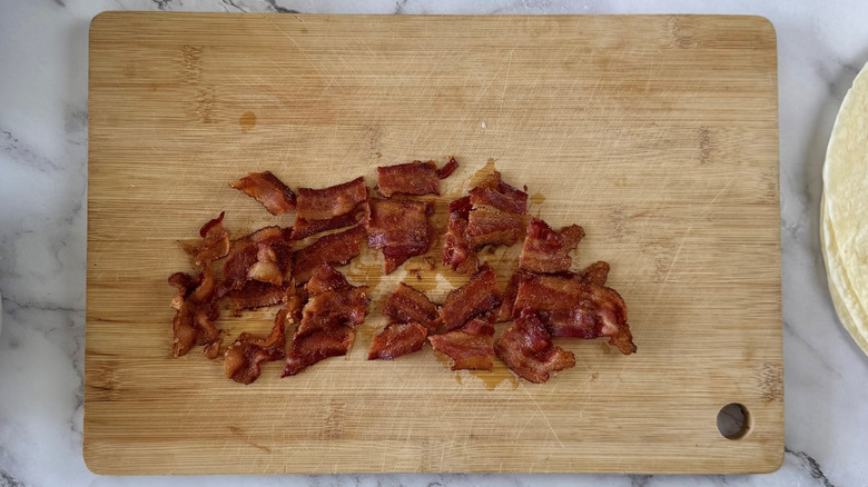 chopped bacon on a wooden board