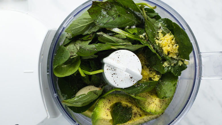 avocado and spinach in processor