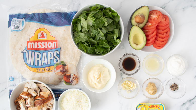 vegetables, condiments, chicken, cheese, and tortillas