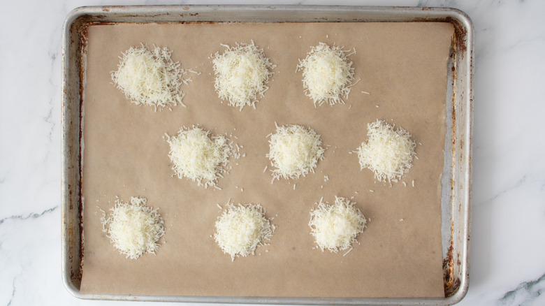 piles of parmesan in a baking pan