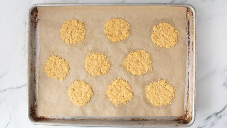 baked parmesan patties in a baking pan