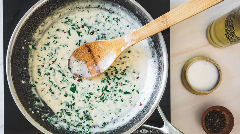 creamy garlic sauce in pan