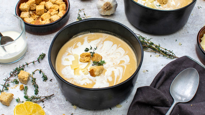 bowl of creamy roasted garlic soup