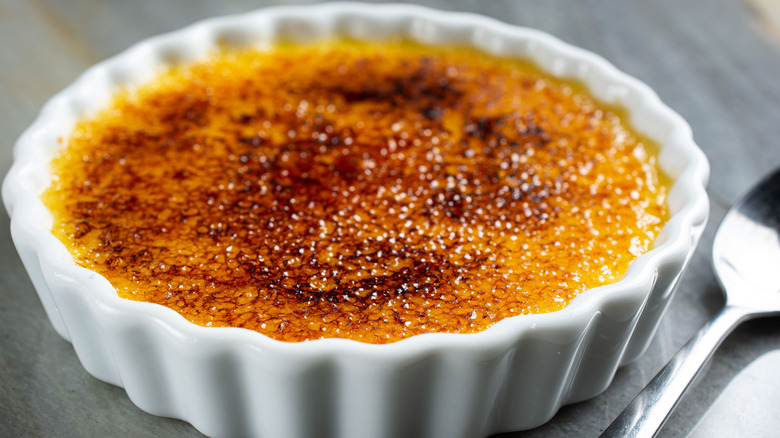 Creme brulee with spoon 