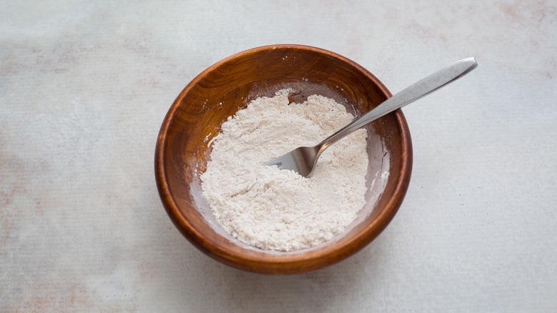 flour mixture in wooden bowl