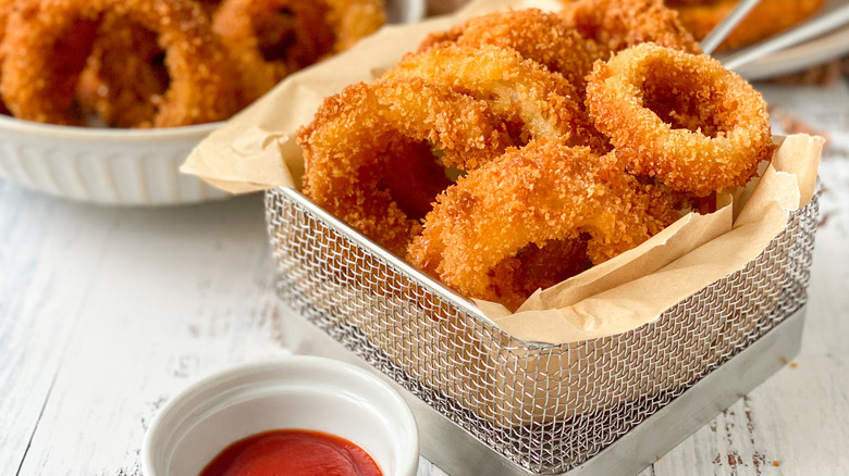 a basket of onion rings