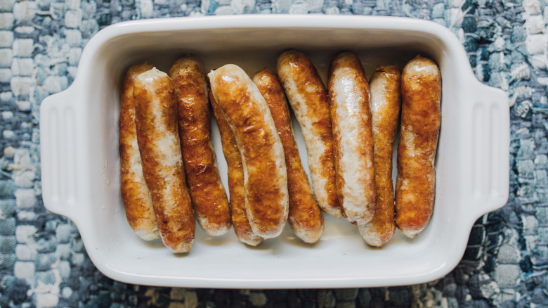 Seared breakfast sausage links in pan