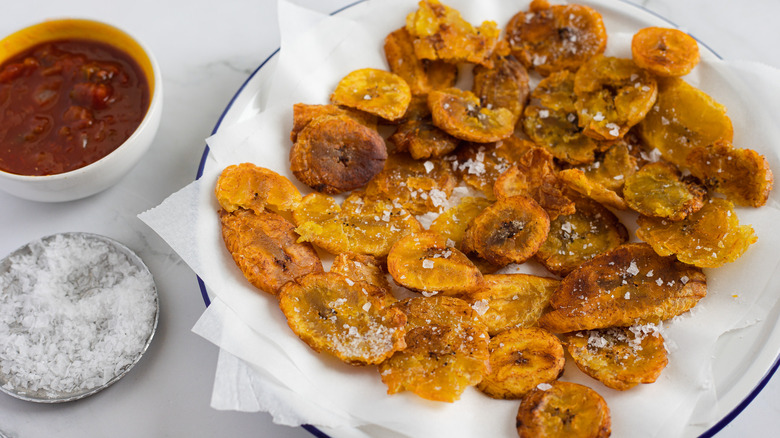 Tostones on plate with salt 