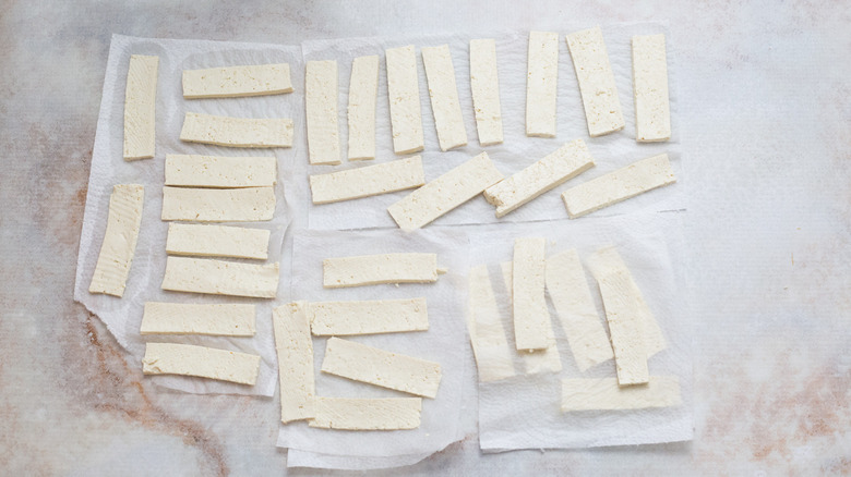 sliced tofu on marble table