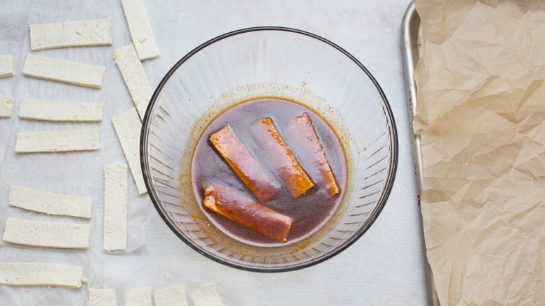 tofu in bowl of marinade