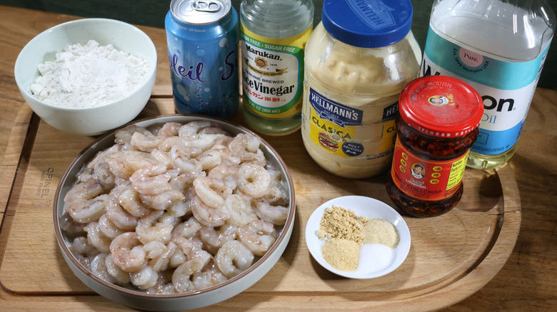 tempura-style popcorn shrimp ingredients laid out on cutting board