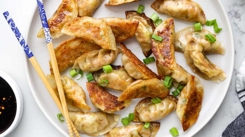 crispy vegetable potstickers on plate