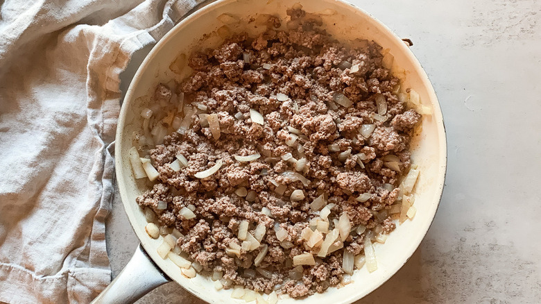 Bison and onion cooking