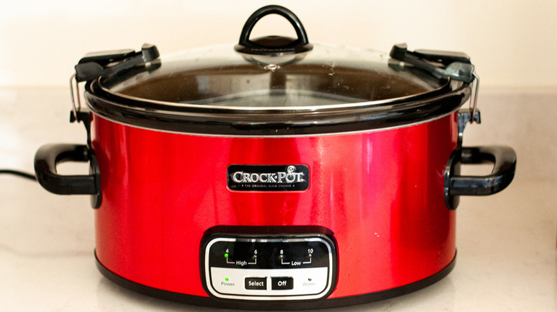 Red crockpot with glass lid