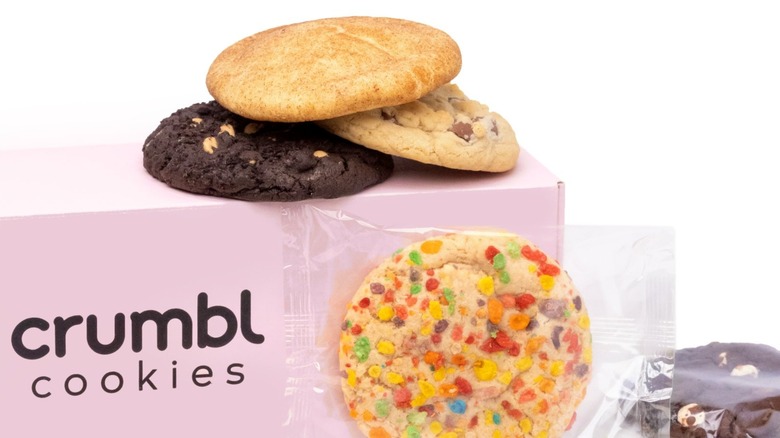 crumbl cookies on pink box