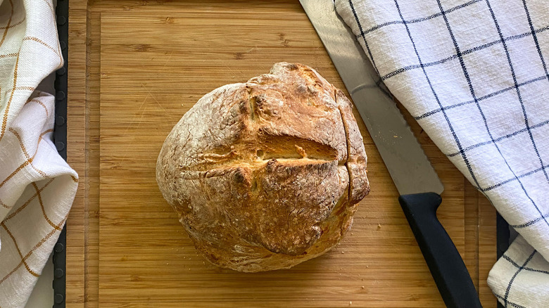 crusty bread on cutting board